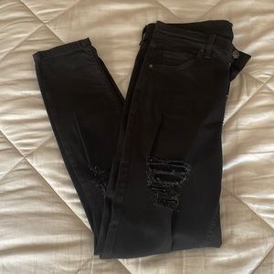 Topshop Jamie black ripped jeans